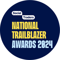 socialtradersaward Young worker looking towards the viewer and smiling